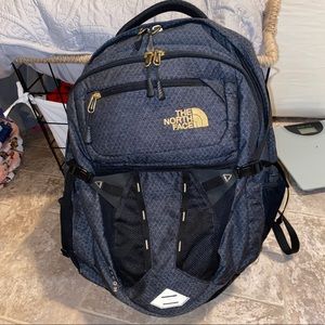 Gray gold & black North Face backpack